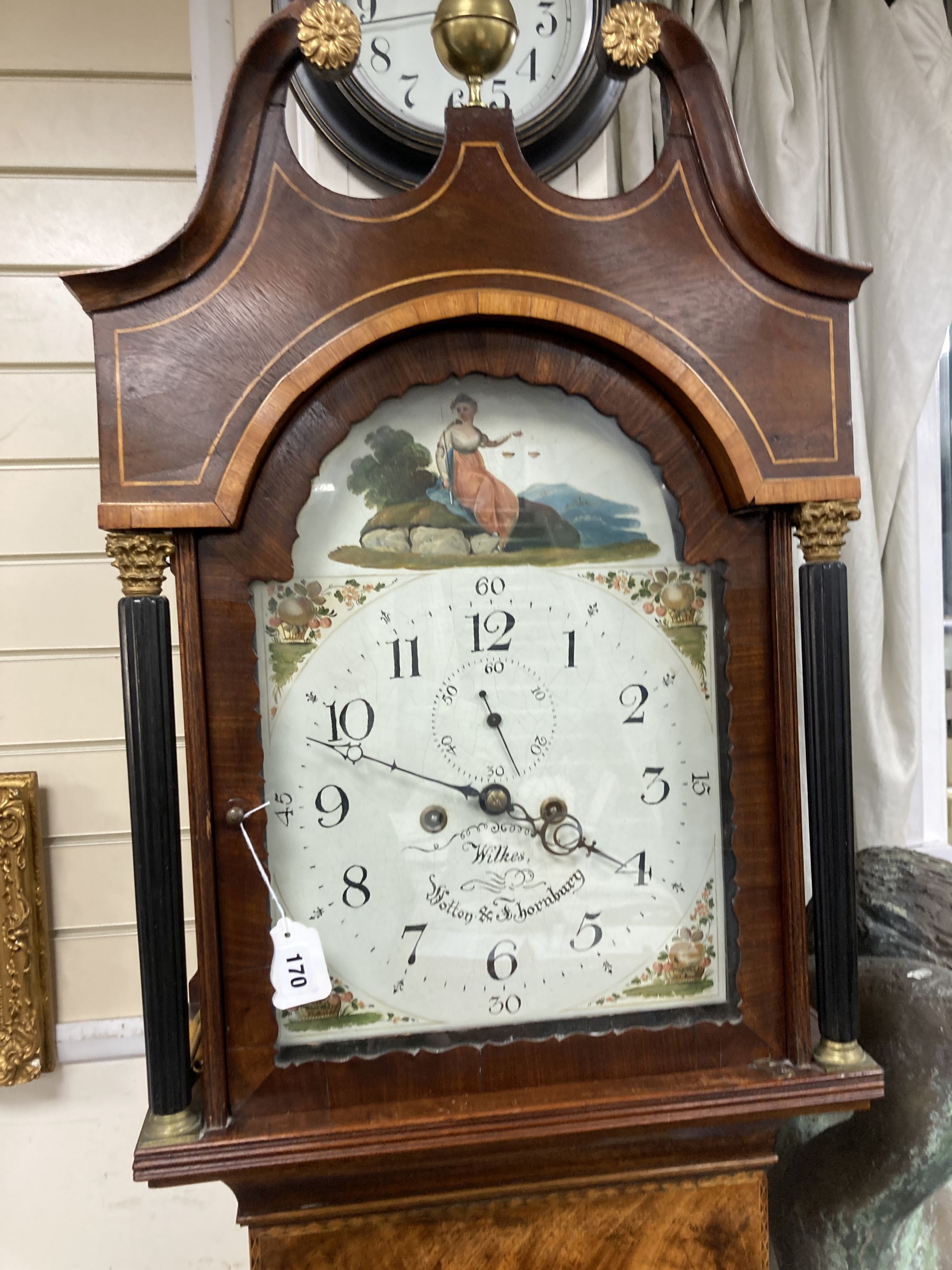 An early 19th century mahogany eight day longcase clock, height 217cm